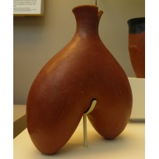 Double flask, single-neck container representing breasts